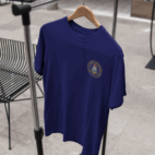 single-t-shirt-mockup-on-a-hanger-while-indoors-a16947